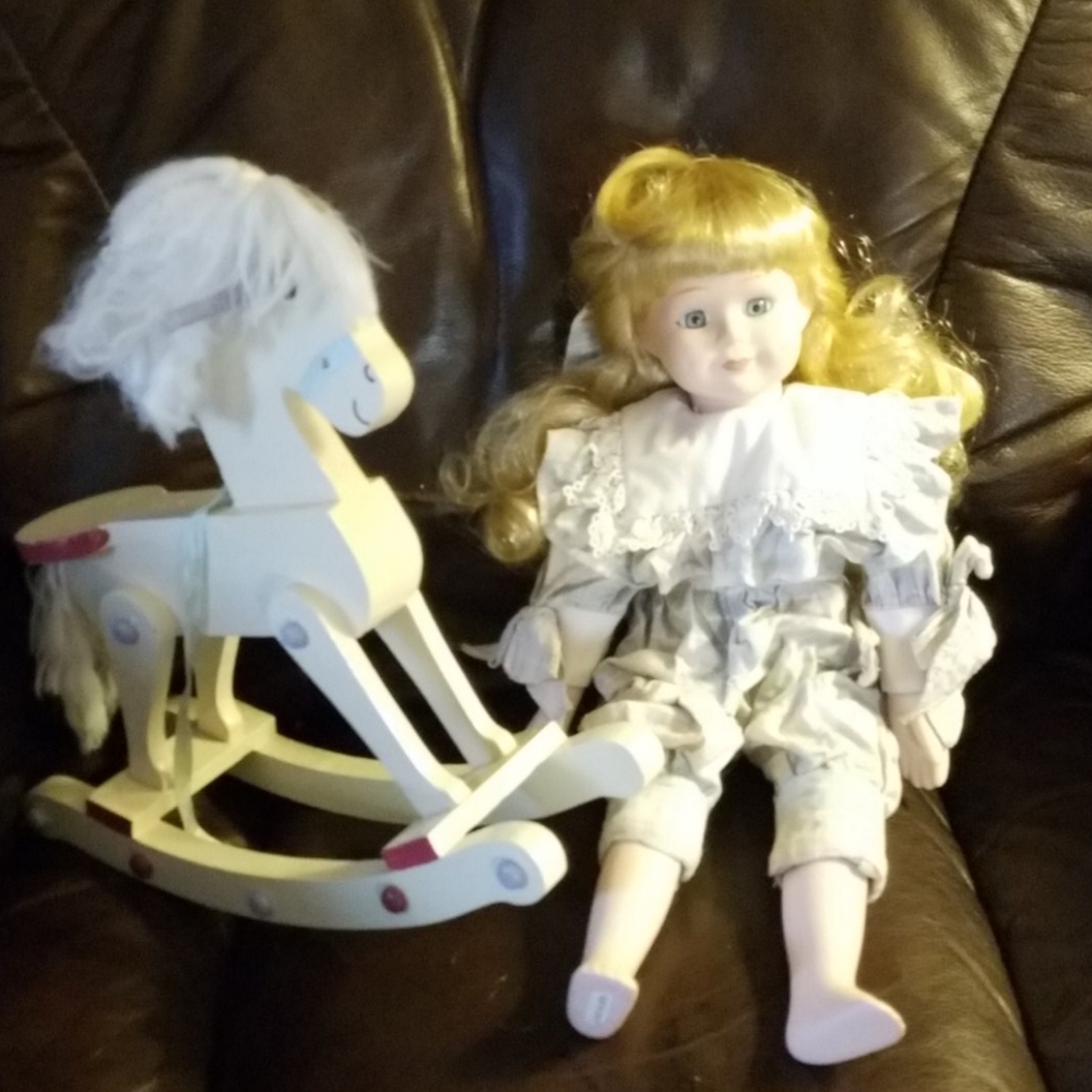 Doll with rocking horse